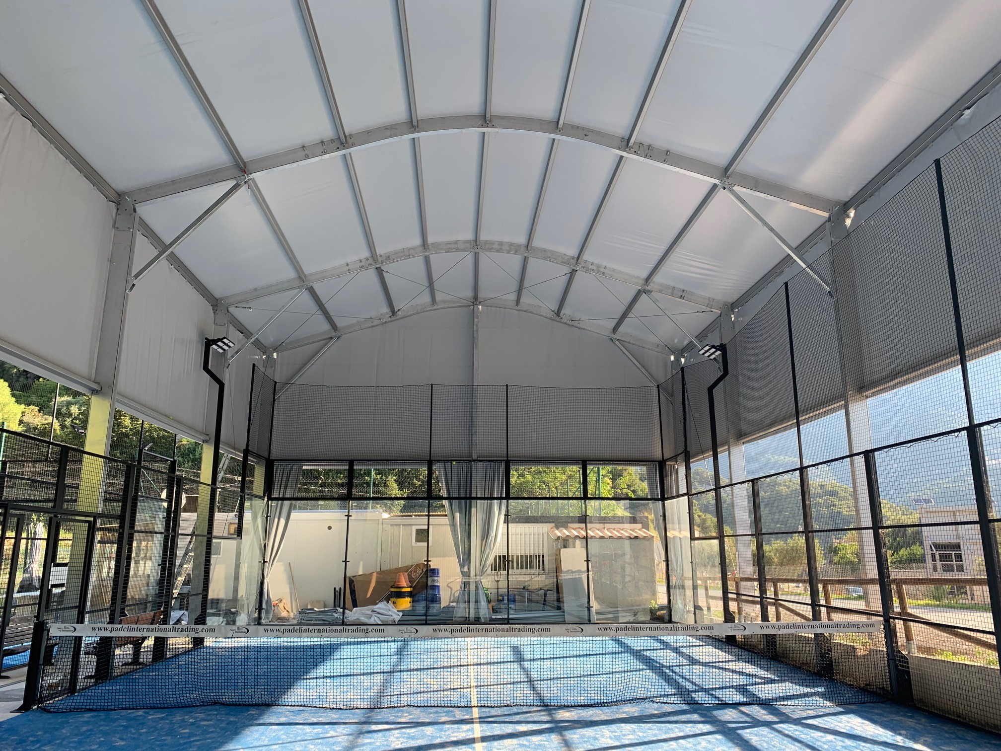 Lauralu steel roof building and padel court cover