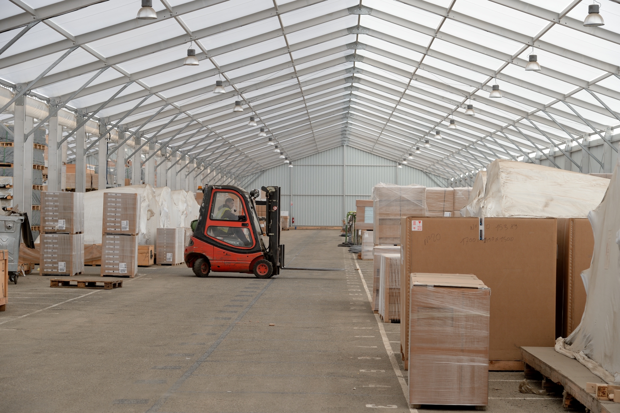 Lauralu temporary warehouse buildings and loading bay canopy forklift operation